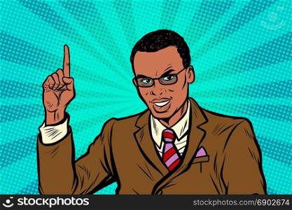 African businessman pointing finger up. Pop art retro vector illustration. African businessman pointing finger up