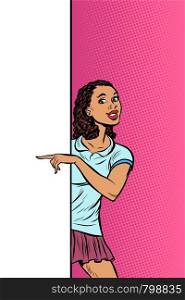 African girl student points to copy space poster advertising. Pop art retro vector Illustrator vintage kitsch drawing. African girl student points to copy space poster advertising