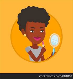 African woman doing makeup. Woman rouge lips with red color lipstick. Young woman paints her lips. Woman applying lips makeup. Vector flat design illustration in the circle isolated on background.. Woman rouge lips with red color lipstick.