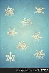 Aged winter card with halftone printed snowflakes