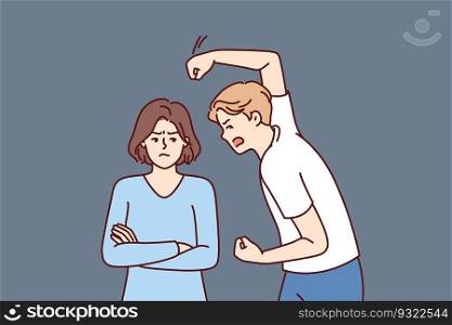 Aggressive man beats woman with violence because of jealousy and suspicion of infidelity or desire to get divorce. Nervous guy swinging his fist at girlfriend for domestic violence concept. Aggressive man beats woman with violence because of jealousy and suspicion of infidelity 