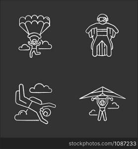 Air extreme sports chalk icons set. Hang gliding, skydiving, wing suiting and paragliding. Outdoor activities. Adrenaline entertainment and risky recreation. Isolated vector chalkboard illustrations
