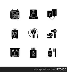 Airplane passenger travelling things black glyph icons set on white space. First aid kit. Weighing baggage. Mini size objects for tourist comfort. Silhouette symbols. Vector isolated illustration. Airplane passenger travelling things black glyph icons set on white space