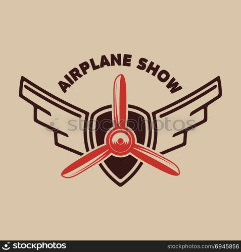 Airplane show. Retro airplane propeller on winged emblem. Design element for logo, label, emblem, sign. Vector illustration