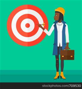 An african-american business woman standing with arrow in hand and aiming at a target board on a green background vector flat design illustration. Square layout.. Business woman with target board.