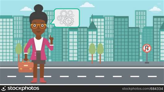 An african-american business woman with a briefcase pointing her forefinger at cogwheels on a city background. Vector flat design illustration. Horizontal layout.. Business woman pointing at cogwheels.