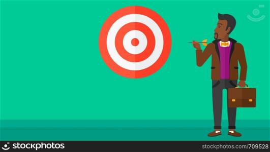 An african-american businessman standing with arrow in hand and aiming at a target board on a green background vector flat design illustration. Horizontal layout.. Businessman with target board.