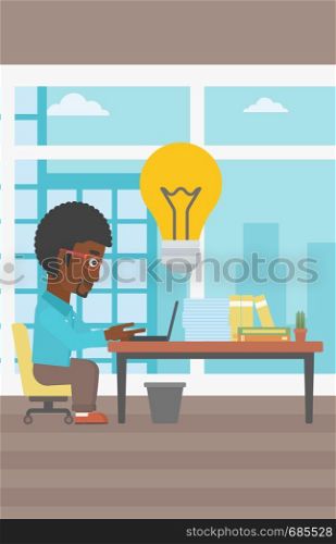 An african-american businessman working on laptop in office and idea bulb above the table. Successful business idea concept. Vector flat design illustration. Vertical layout.. Successful business idea vector illustration.