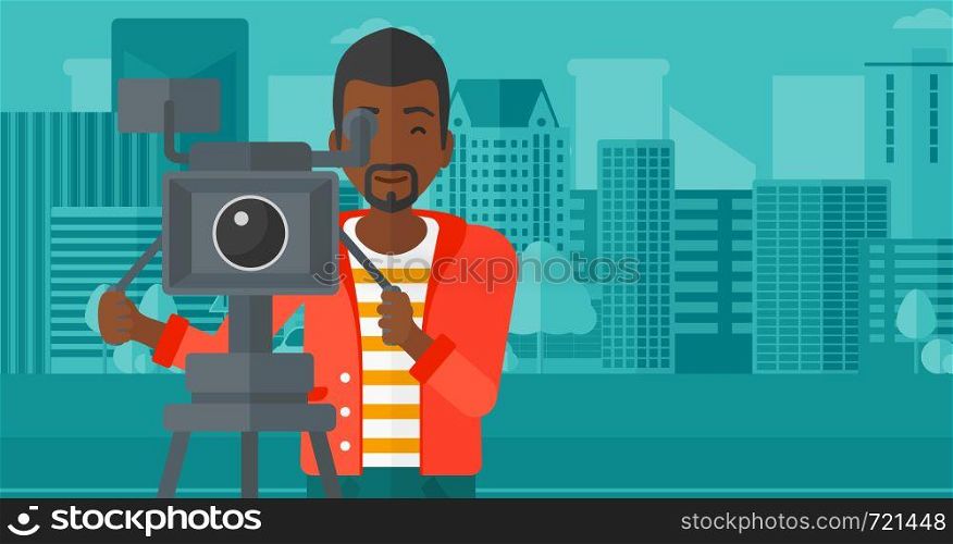 An african-american cameraman looking through movie camera on a city background vector flat design illustration. Horizontal layout.. Cameraman with movie camera on a tripod.