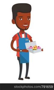 An african-american delivery man holding a box of cakes. Baker delivering cakes. Young delivery man with cupcakes. Food delivery service. Vector flat design illustration isolated on white background.. Baker delivering cakes vector illustration.