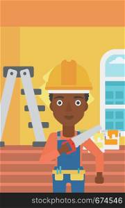An african-american female worker holding a saw in hand on a background of room with paint cans and ladder vector flat design illustration. Vertical layout.. Smiling worker with saw.