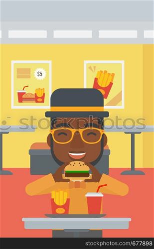 An african-american man eating hamburger on a cafe background vector flat design illustration. Vertical layout.. Man eating hamburger.