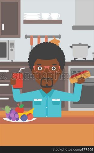 An african-american man holding a hotdog in one hand and soda in another on a kitchen background vector flat design illustration. Vertical layout.. Man with fast food.