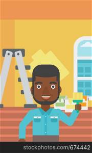 An african-american man holding a paint brush on a background of room with paint cans and ladder vector flat design illustration. Vertical layout.. Painter with paint brush.