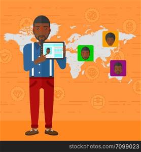 An african-american man holding a tablet computer and avatars on the map behind him on an orange background with business icons vector flat design illustration. Square layout.. Man holding tablet computer with social media source.