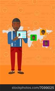 An african-american man holding a tablet computer and avatars on the map behind him on an orange background with business icons vector flat design illustration. Vertical layout.. Man holding tablet computer with social media source.
