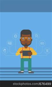 An african-american man holding a tablet computer and some icons connected to the device on a light blue background vector flat design illustration. Vertical layout.. Man holding tablet computer.
