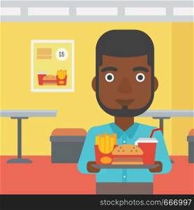 An african-american man holding a tray full of junk food on a cafe background vector flat design illustration. Square layout.. Man with fast food.