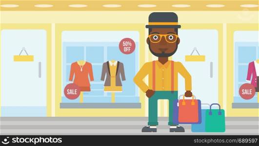 An african-american man holding shopping bags on the background of boutique window with dressed mannequins. Happy young man carrying shopping bags. Vector flat design illustration. Horizontal layout.. Happy man with shopping bags vector illustration.