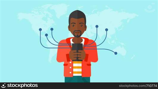 An african-american man holding smartphone connected with the whole world on a blue background vector flat design illustration. Horizontal layout.. Man using smartphone.