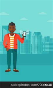 An african-american man holding vibrating smartphone on a city background vector flat design illustration. Vertical layout.. Man holding ringing telephone.