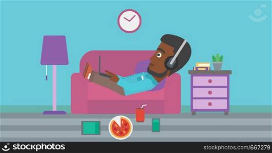 An african-american man in headphones lying on a sofa in living room with electronic devices and fast food vector flat design illustration. Horizontal layout.. Man lying on sofa with many gadgets.
