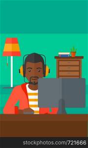 An african-american man in headphones sitting in front of computer monitor with mouse in hand on living room background vector flat design illustration. Vertical layout.. Man playing video game.