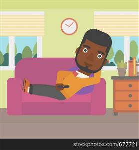 An african-american man lying on a sofa and watching tv with a remote control in his hand vector flat design illustration. Square layout.. Man lying on sofa.