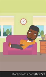 An african-american man lying on a sofa and watching tv with a remote control in his hand vector flat design illustration. Vertical layout.. Man lying on sofa.