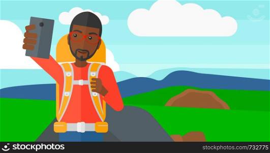 An african-american man making selfie on the background of hilly countryside vector flat design illustration. Horizontal layout.. Backpckaer making selfie.