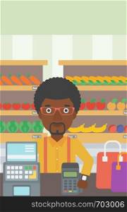 An african-american man paying wireless with his smart watch at the supermarket. Male customer making payment for purchase with smart watch. Vector flat design illustration. Vertical layout.. Man paying wireless with smart watch.