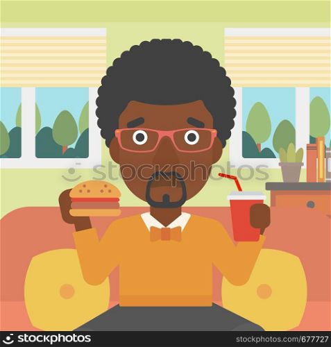 An african-american man sitting on a sofa while eating hamburger and drinking soda on the background of living room vector flat design illustration. Square layout.. Man eating hamburger.