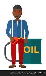 An african-american man standing beside the oil can and holding filling nozzle vector flat design illustration isolated on white background. . Man with oil can and filling nozzle.