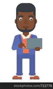 An african-american man standing with laptop in the hands vector flat design illustration isolated on white background. Vertical layout.. Man using laptop.