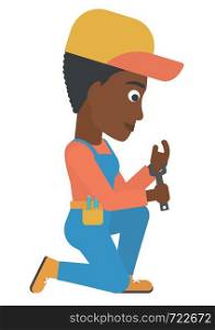 An african-american repairer sitting with a spanner in hand vector flat design illustration isolated on white background. . Repairer holding spanner.