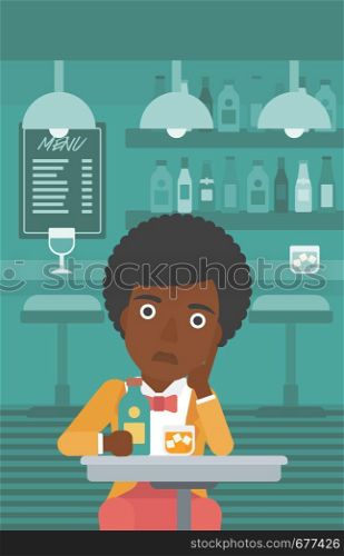 An african-american sad woman sitting at the table with a bottle and a glass at the bar vector flat design illustration. Vertical layout.. Sad woman with bottle and glass.