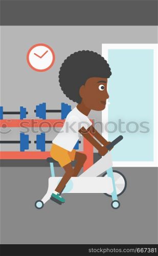 An african-american woman exercising on stationary training bicycle in the gym vector flat design illustration. Vertical layout.. Woman doing cycling exercise.