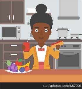 An african-american woman holding a hotdog in one hand and soda in another on a kitchen background vector flat design illustration. Square layout.. Woman with fast food.
