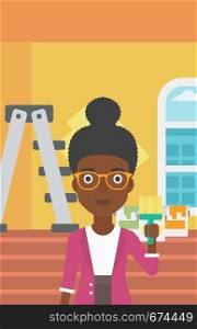 An african-american woman holding a paint brush on a background of room with paint cans and ladder vector flat design illustration. Vertical layout.. Painter with paint brush.