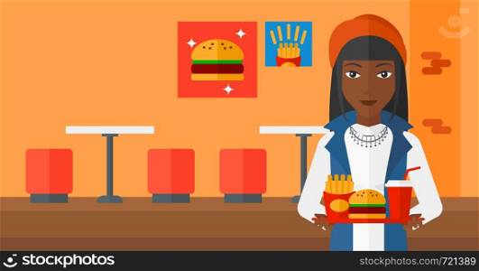 An african-american woman holding a tray full of junk food on a cafe background vector flat design illustration. Horizontal layout.. Woman with fast food.