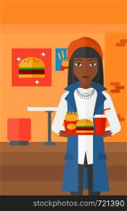 An african-american woman holding a tray full of junk food on a cafe background vector flat design illustration. Vertical layout.. Woman with fast food.