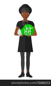 An african-american woman holding in hands a big light bulb with small wind turbines inside vector flat design illustration isolated on white background. . Woman with lightbulb and windmills inside.