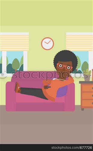 An african-american woman lying on a sofa and watching tv with a remote control in her hand vector flat design illustration. Vertical layout.. Woman lying on sofa.