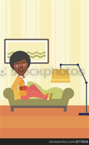An african-american woman lying on sofa in living room and holding a cup of hot flavored tea vector flat design illustration. Vertical layout.. Woman lying with cup of tea.