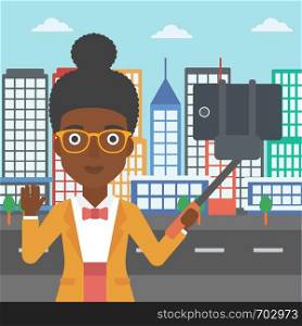 An african-american woman making selfie with a selfie-stick. An african-american woman taking photo with cellphone and waving on a city background. Vector flat design illustration. Square layout.. Woman making selfie vector illustration.