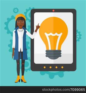 An african-american woman pointing at a big tablet computer with a light bulb on a screen on a blue background with cogwheels vector flat design illustration. Square layout.. Woman pointing at tablet computer with light bulb on screen.