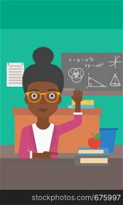 An african-american woman raising her hand while sitting at the table on the background of classroom vector flat design illustration. Vertical layout.. Woman raising her hand.