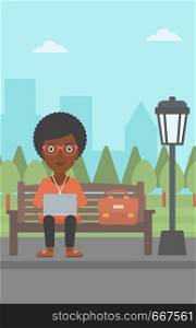 An african-american woman sitting in the park on a bench and working on a laptop vector flat design illustration. Vertical layout.. Woman working on laptop.