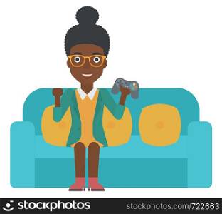 An african-american woman sitting on a sofa with gamepad in hands vector flat design illustration isolated on white background.. Woman playing video game.