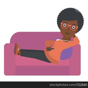 An african-american woman sitting on the couch with remote control vector flat design illustration isolated on white background. . Woman sitting on the couch with remote control.